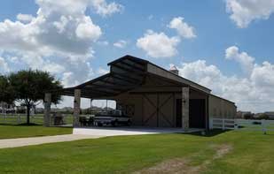 Large Custom Metal Barn with Front Overhang